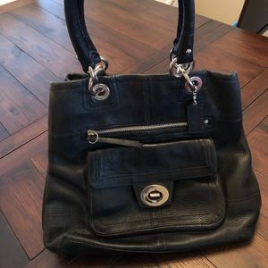Coach, black leather handbag.